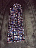 Photo du vitrail de saint Julien l'Hospitalier dans le déambulatoire nord