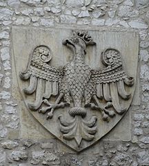 A bas-relief of Piast Eagle designed by Jan Matejko over the entrance to the gate