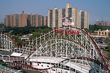 The Cyclone, with high-rise apartment buildings in the background