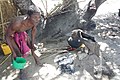 Distilling cashew apple liquor (muchekele) in Mozambique