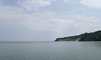 Cape Nordperd seen from Göhren Pier. Left of the cape is the Buskam