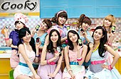 Girls' Generation posing for the camera while holding LG cooky phones