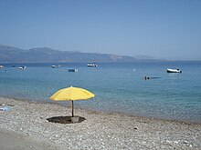 View of the fine gravel beach in the summer