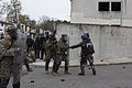 Gendarmes mobiles et Marines américains lors d'un exercice à Saint-Astier en décembre 2014.