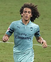 A colour photograph of Matteo Guendouzi, in action for Arsenal.