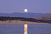 Moonrise over Hauser Lake by Black Sandy
