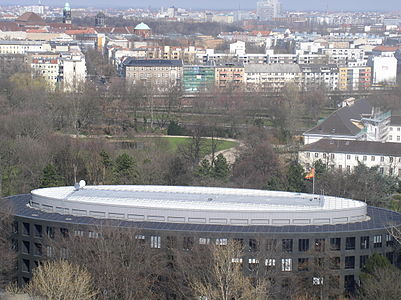 The Federal Presidency's oval office building from the Victory Column. The palace and Moabit quarter in the background.