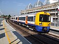Class 378 unit with London Overground livery calls at the brand new Imperial Wharf railway station.