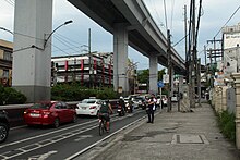 Portion of Aurora Boulevard near the station. The LRT Line 2 viaduct is seen above.