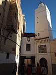 Mzellja Mosque, with a decorative panel of square Kufic above its entrance (right)