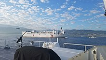The USCGC Margaret Norvell (WPC 1105) and USCGC Kathleen Moore (WPC 1109) escort the USNS Comfort (T-AH 20) into Port-au-Prince, Haiti for Operation Enduring Promise 2019.