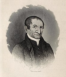 Engraving of a man in suit with slicked-back hair