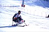 David Munk using outrigger skis