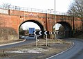 Acorn bridge carries the Great Western Main Line across the A420 road. The carriageway on the right uses the arch that originally spanned the Wilts & Berks Canal.