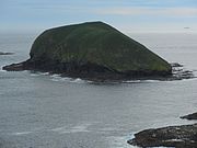 The eastern of the two islands, closest to the coast