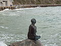 For the Folkestone Triennial (art show) in 2011, Cornelia Parker made a bronze statue of a mermaid – a life cast of resident Georgina Baker. Wear Bay Road is behind.