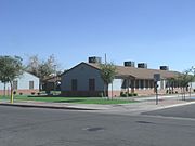 The Marcos de Niza Housing Project was established by Father Emmett McLoughlin in 1941. The housing project is located at 305 W. Pima St. This property is recognized as historic by the Hispanic American Historic Property Survey of the City of Phoenix.