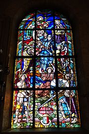 A 20th-century window depicting warriors from history and the First World War