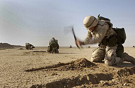 US Navy Seabees digging 'hasty scrapes', 2003.