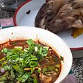 The Thai dish Yam tin khwai is a spicy and sour Northern Thai soup made with the hoof of a water buffalo