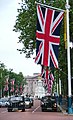 Image 59Union Flag being flown on The Mall, London looking towards Buckingham Palace (from Culture of the United Kingdom)