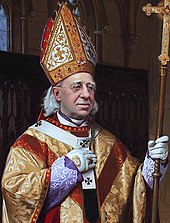 Illustration of a white-haired bespectacled man wearing a mitre, liturgical vestments, pallium, episcopal gloves, and holding a processional cross in his left hand.