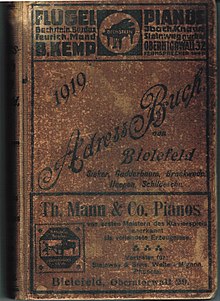 Werbung von Pianohaus B. Kemp und Pianofabrik Th. Mann & Co. auf dem Buchdeckel des Adressbuchs von Bielefeld von 1919.