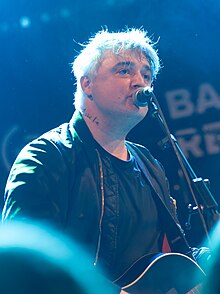 Doherty performing in 2024