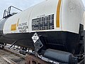 Image 43Trains carrying hazardous materials display information identifying their cargo and hazards. This tank car carrying chlorine displays, among other markings, a U.S. DOT placard showing a UN number that identifies the hazardous substance. (from Train)