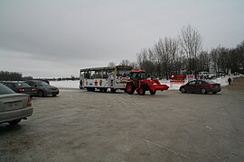 Sightseeing in a train pulled by a tractor, automobiles near descent # 3