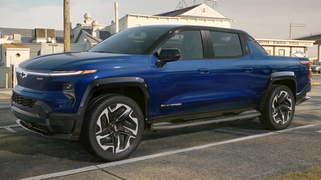 Chevrolet Silverado EV at a parking lot.