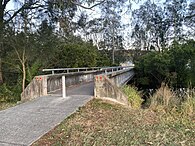 Foot bridge over North Creek entering into Feighan Park.