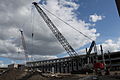 A Link-Belt Lattice Crawler, more specifically a Link-Belt 348 HYLAB 5, crane at a parking garage construction site at UCF.