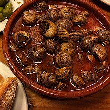 Escargots cuits en sauce