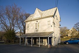 A white building against a clear sky