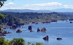 A 2007 view of the coastline south of Trinidad overlooking Trinidad Bay with offshore rocks; part of the California Coastal National Monument.