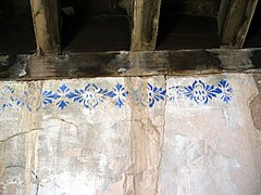 Vista del interior de la ermita de San Pedro en El Cuervo (Teruel), con detalle de la estructura de la cubierta y cenefas de azulete por debajo del estribo.