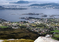 View of Langevåg (looking towards the town of Ålesund, administrative center of the neighbouring municipality)