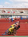 Image 9Men assuming the starting position for a sprint race (from Track and field)
