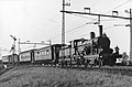 NS 1718 with an empty stock train, as the last steam train on the electrified route Rotterdam Hofplein - The Hague, near Leidschendam. (31-10-1947)