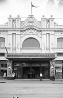 Image showcasing the theatre's iconic checkered parapet and led light windows. Marquee advertising guest Wurlitzer organist, Manny Aarons