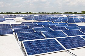 Solar PV modules mounted on a flat roof.