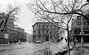 Partially shielded from snipers by stacked shipping containers (left), pedestrians and a solitary car hurry across the lethal Skenderija junction on Maršala Tita (Marshal Tito Street), which becomes Vojvode Putnika, or ‘Sniper Alley’, the road to the airport. Ðure Ðakovića, the street at far right, soon climbs uphill, making it an easy sniper target above the containers.