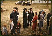 Saying grace before the barbeque dinner in Pie Town, 1940