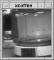 Image 13 Trojan Room coffee pot Picture: Quentin Stafford-Fraser The Trojan Room coffee pot was the inspiration for the world's first webcam. The coffee pot was located in the corridor just outside the so-called Trojan Room within the old Computer Laboratory of the University of Cambridge. The webcam was created in 1991 to help people working in other parts of the building avoid pointless trips to the coffee pot by providing, on the user's desktop computer, a live 128×128 pixel greyscale picture of the state of the coffee pot. The webcam was shut down on 22 August 2001, following the Computer Laboratory's move to the William Gates Building. More selected pictures