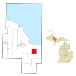 Location within Marquette County (red) and administered portion of the K.I. Sawyer community (pink)
