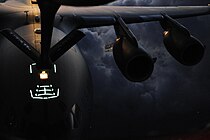 Flying boom refuelling at night.