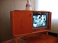 Image 31The 1950s was the beginning period of rapid television ownership. In their infancy, television screens existed in many forms, including round. (from 1950s)