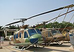 A Bell 205 and a Bell 212 general-purpose helicopter in the IAF Museum at Hatzerim Airbase