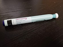 A standard 70mg/mL Aimovig autoinjector